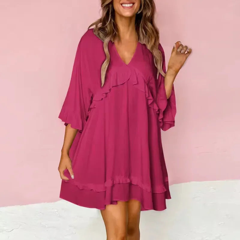 Hot pink - Black crepe swing mini dress featuring a V-neckline, half flutter sleeves, and ruffle trim detailing across the bodice and hem.