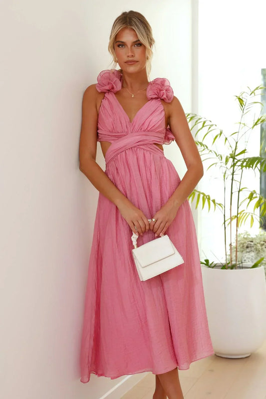 Hue - Light pink midi dress featuring a ruched crossover bodice, side cutouts, and 3D rosette shoulder details.