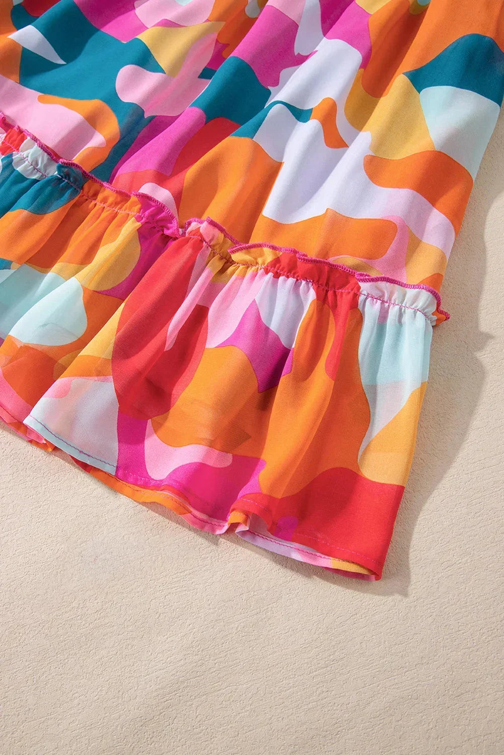 Orange - Women's abstract print chiffon mini dress featuring a V-neckline, long voluminous sleeves, and a tiered ruffled hem.