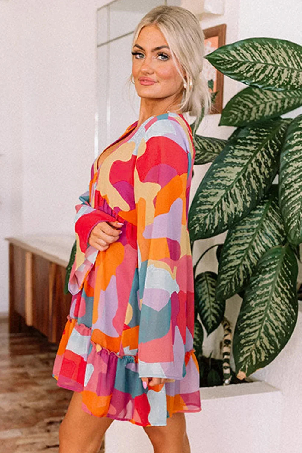 Orange - Women's abstract print chiffon mini dress featuring a V-neckline, long voluminous sleeves, and a tiered ruffled hem.