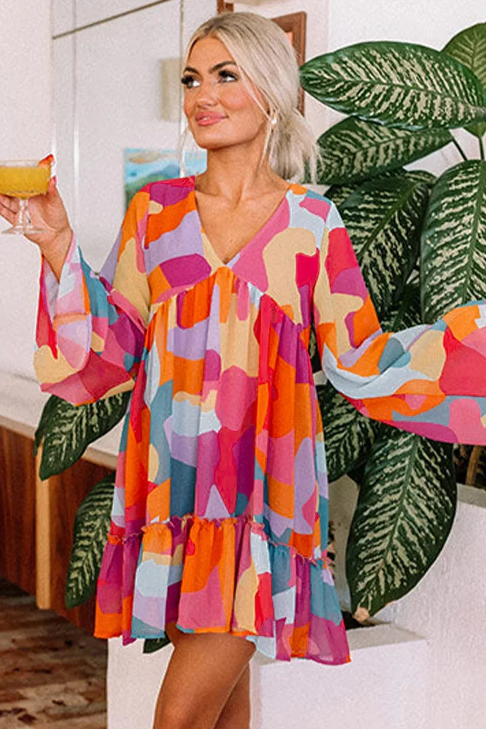 Orange - Women's abstract print chiffon mini dress featuring a V-neckline, long voluminous sleeves, and a tiered ruffled hem.