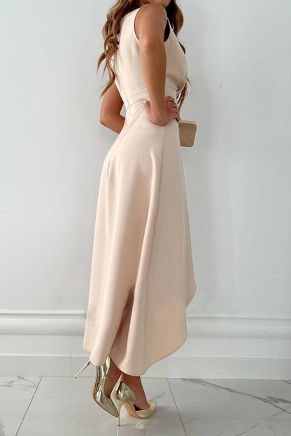 Beige - Sleeveless light beige crepe midi dress featuring a surplice V-neckline, cascading waist ruffle, and an asymmetrical high-low hemline.