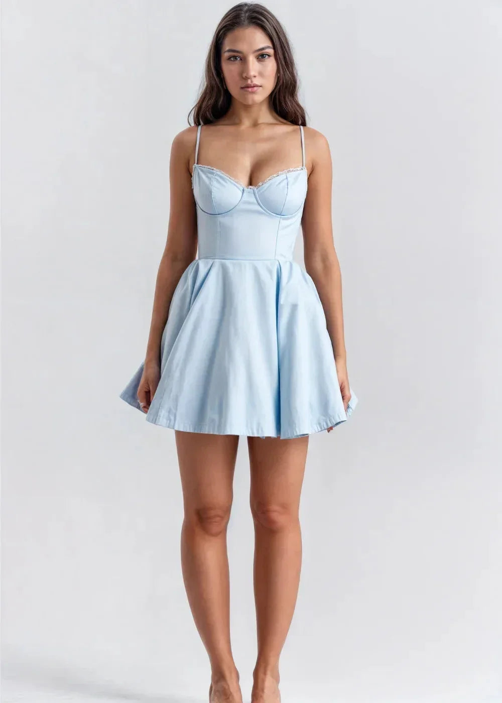 Blue - Light pink fit-and-flare mini dress featuring a structured bustier bodice with lace trim, spaghetti straps, and a voluminous skirt with a visible tulle hem underlay.
