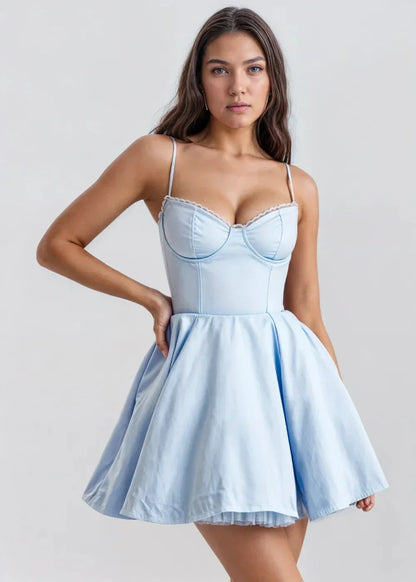 Blue - Light pink fit-and-flare mini dress featuring a structured bustier bodice with lace trim, spaghetti straps, and a voluminous skirt with a visible tulle hem underlay.