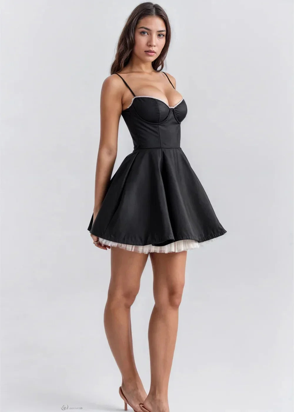 Black - Light pink fit-and-flare mini dress featuring a structured bustier bodice with lace trim, spaghetti straps, and a voluminous skirt with a visible tulle hem underlay.