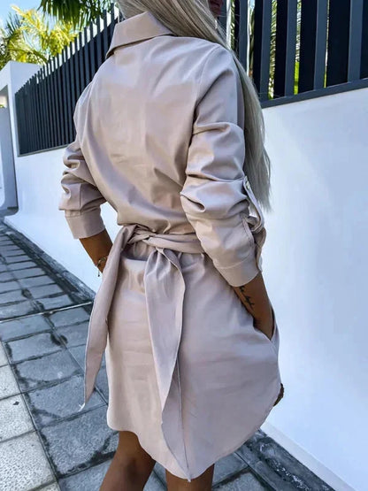 Khaki - Bright green crisp button-front mini shirt dress with a point collar, rolled sleeves, and a defined tie-waist.