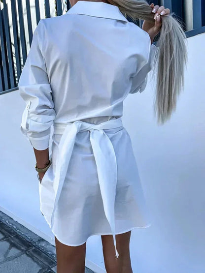 White - Bright green crisp button-front mini shirt dress with a point collar, rolled sleeves, and a defined tie-waist.