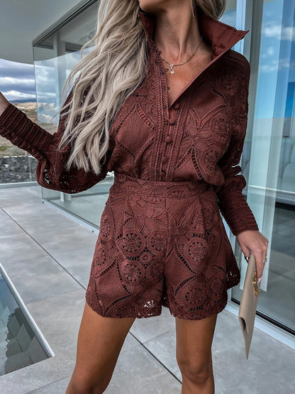 Coffee - White large-scale medallion crochet romper with long balloon sleeves, pointed collar, fabric-covered button placket, and high-waisted relaxed shorts.