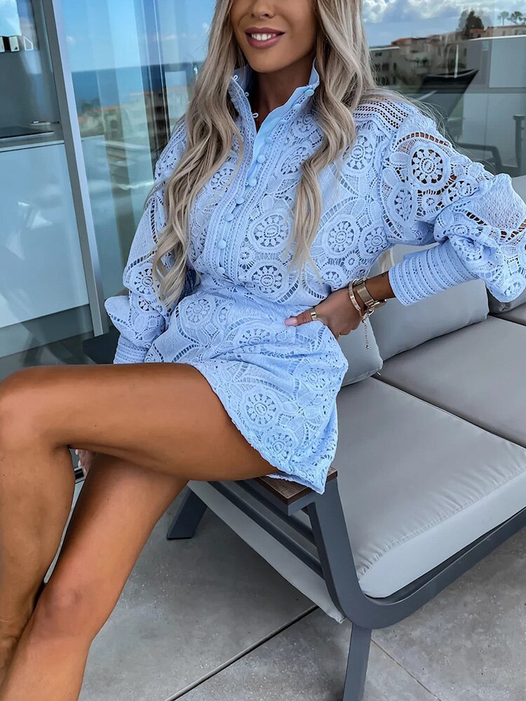 Beige - White large-scale medallion crochet romper with long balloon sleeves, pointed collar, fabric-covered button placket, and high-waisted relaxed shorts.