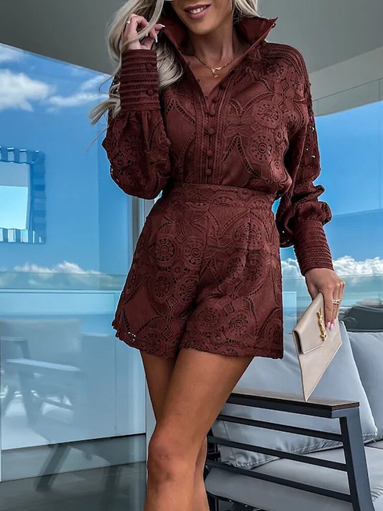 Coffee - White large-scale medallion crochet romper with long balloon sleeves, pointed collar, fabric-covered button placket, and high-waisted relaxed shorts.