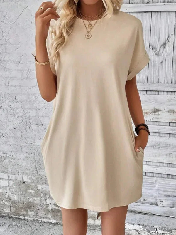 Khaki - Solid red short-sleeve shift mini dress featuring a crew neckline, rolled cuffs, and side seam pockets.