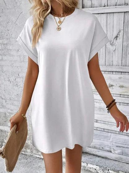 White - Solid red short-sleeve shift mini dress featuring a crew neckline, rolled cuffs, and side seam pockets.