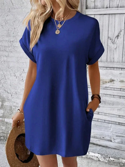 Blue - Solid red short-sleeve shift mini dress featuring a crew neckline, rolled cuffs, and side seam pockets.