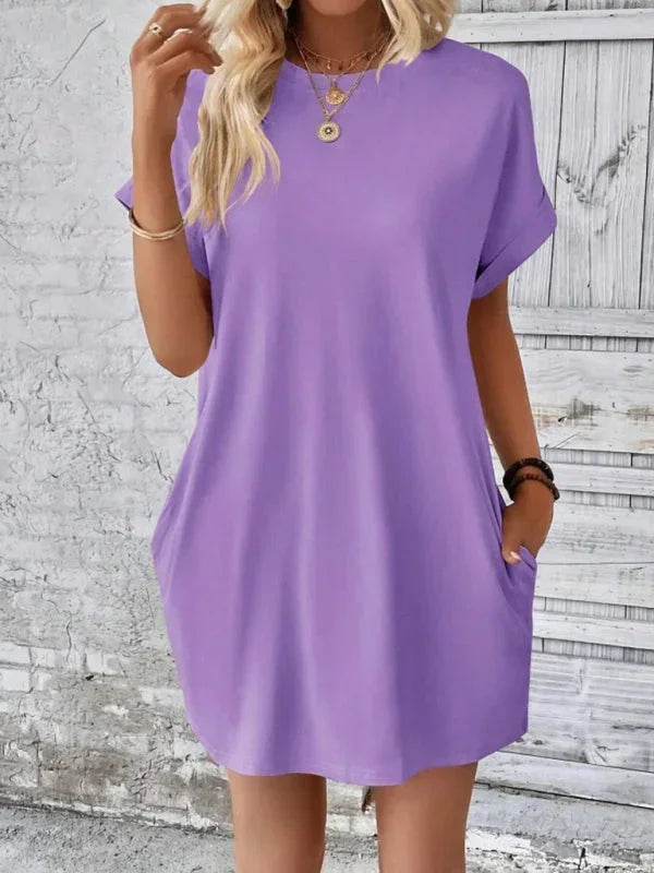 Blue - Solid red short-sleeve shift mini dress featuring a crew neckline, rolled cuffs, and side seam pockets.