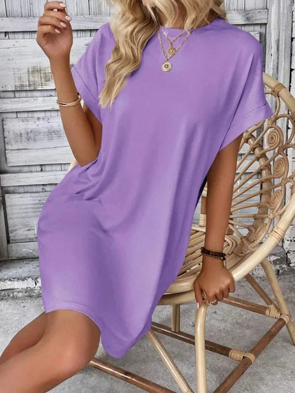 Blue - Solid red short-sleeve shift mini dress featuring a crew neckline, rolled cuffs, and side seam pockets.