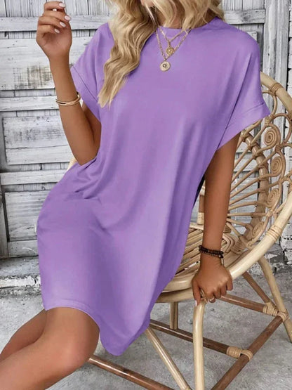 Blue - Solid red short-sleeve shift mini dress featuring a crew neckline, rolled cuffs, and side seam pockets.