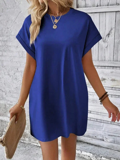 Blue - Solid red short-sleeve shift mini dress featuring a crew neckline, rolled cuffs, and side seam pockets.