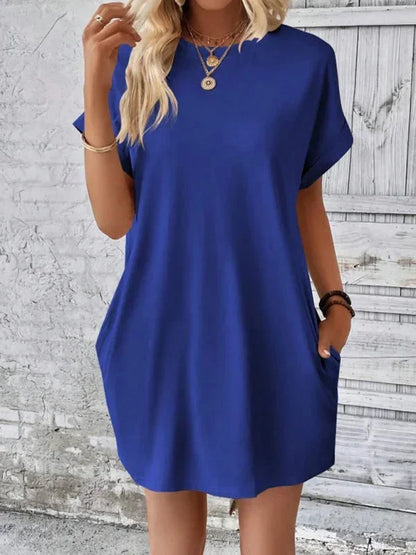 Blue - Solid red short-sleeve shift mini dress featuring a crew neckline, rolled cuffs, and side seam pockets.