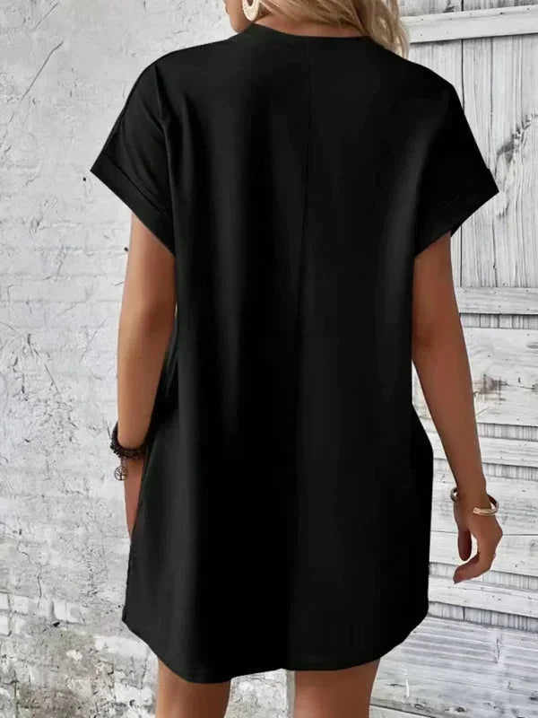 Orange - Solid red short-sleeve shift mini dress featuring a crew neckline, rolled cuffs, and side seam pockets.