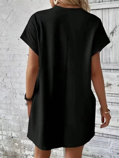 Orange - Solid red short-sleeve shift mini dress featuring a crew neckline, rolled cuffs, and side seam pockets.