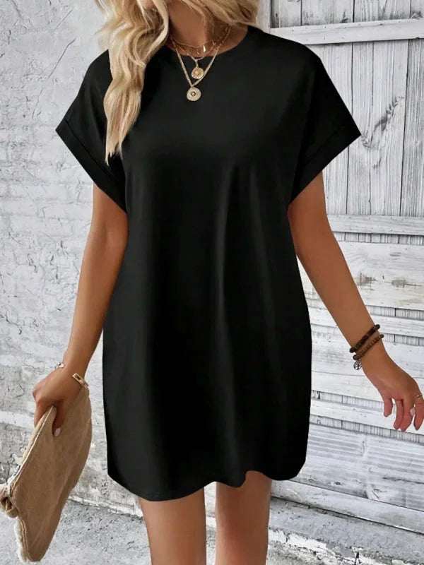 Orange - Solid red short-sleeve shift mini dress featuring a crew neckline, rolled cuffs, and side seam pockets.