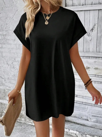 Orange - Solid red short-sleeve shift mini dress featuring a crew neckline, rolled cuffs, and side seam pockets.