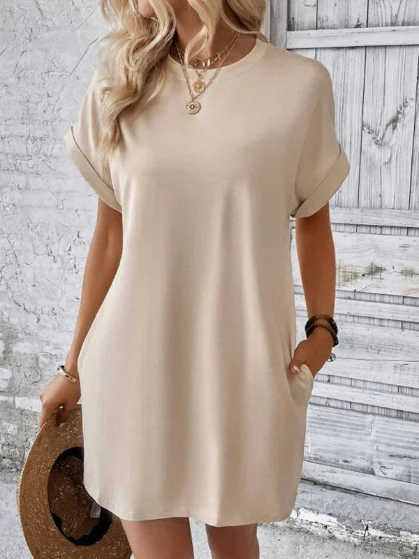 Khaki - Solid red short-sleeve shift mini dress featuring a crew neckline, rolled cuffs, and side seam pockets.