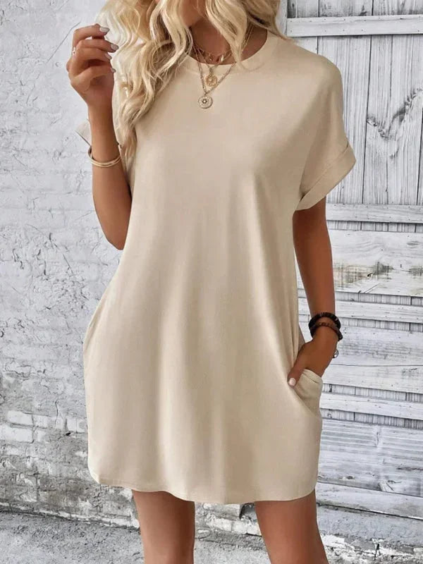 Khaki - Solid red short-sleeve shift mini dress featuring a crew neckline, rolled cuffs, and side seam pockets.