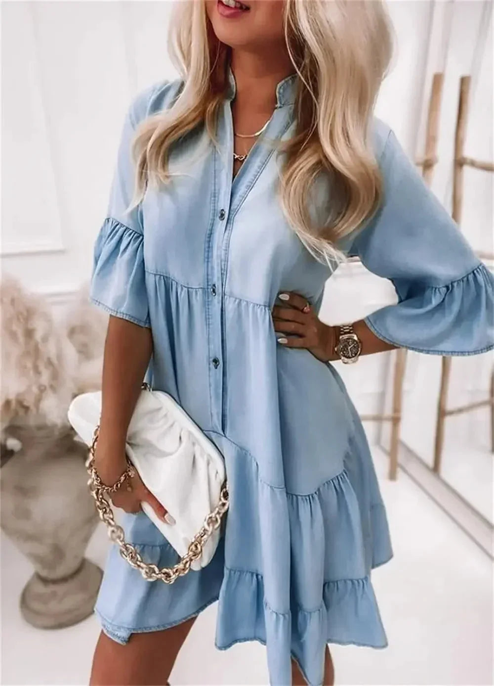 denim - Light blue denim tiered mini dress featuring a collared neckline, half-button placket, and three-quarter bell sleeves.