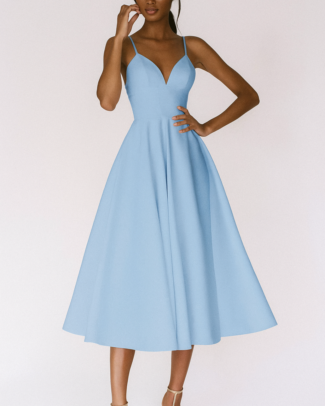 Blue - A woman wearing a structured white textured crepe midi dress with double spaghetti straps, a sweetheart neckline, and a flared A-line skirt.