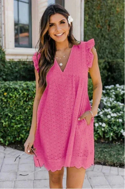 Pink - White eyelet mini dress featuring a V-neckline, ruffle flutter sleeves, and a scalloped hem.