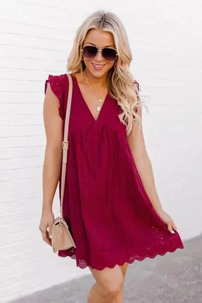 Burgundy - Black eyelet V-neck mini dress with flutter sleeves and a scalloped hem.