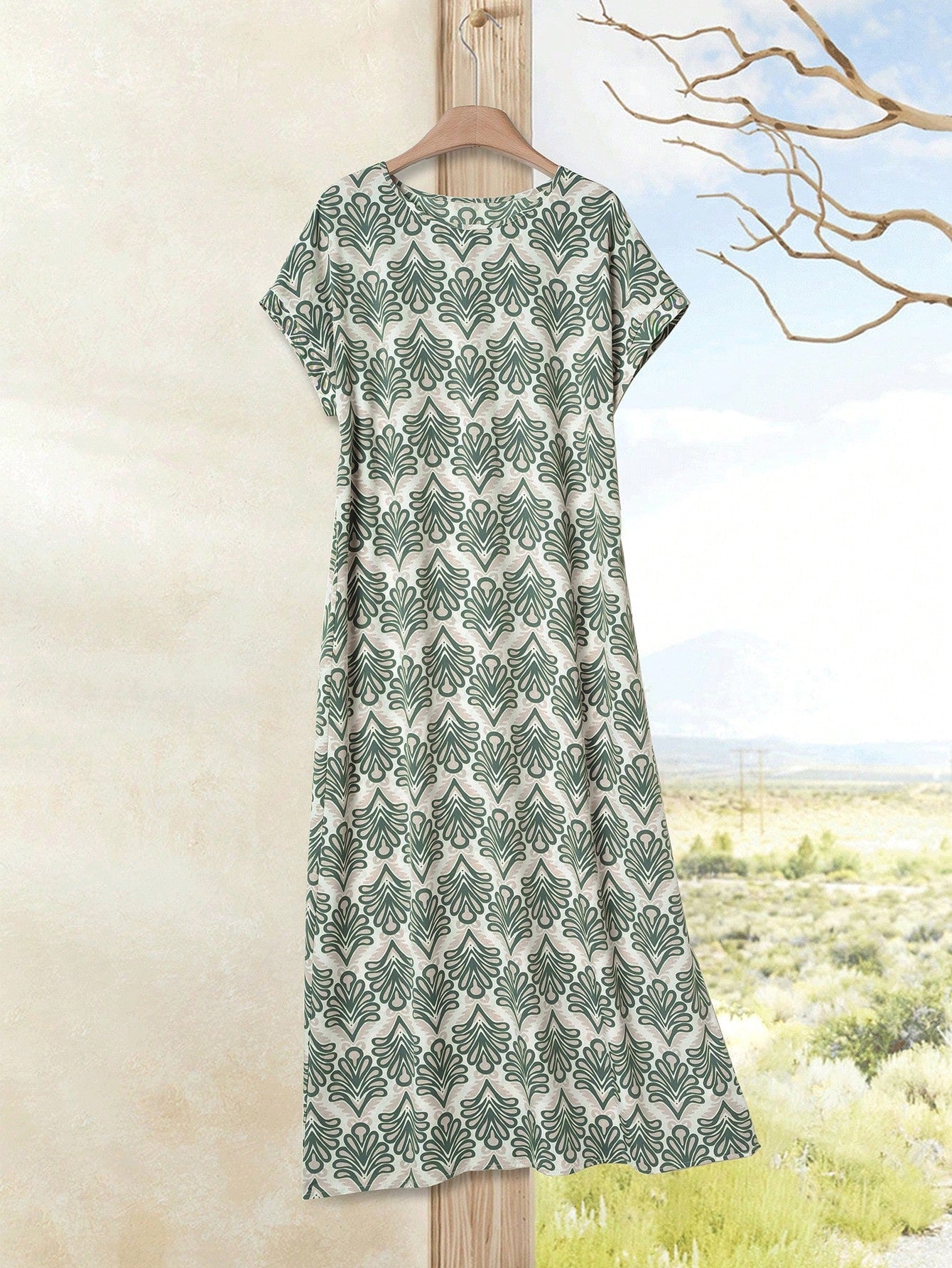 Dark Blue - A woman wearing a beige fine-knit maxi dress with cap sleeves and a crew neck, styled with gold jewelry and a woven clutch in a minimalist interior.