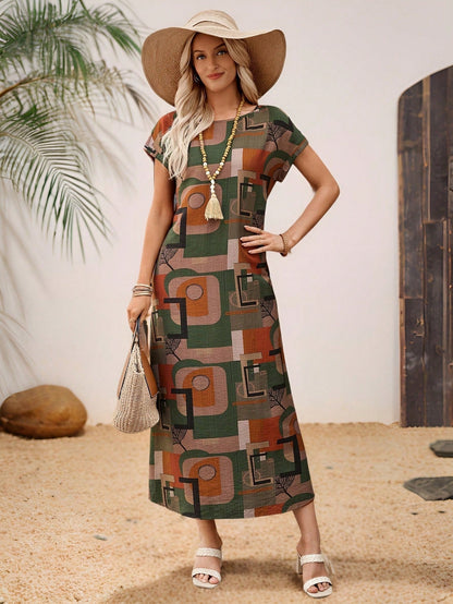 Dark Blue - A woman wearing a beige fine-knit maxi dress with cap sleeves and a crew neck, styled with gold jewelry and a woven clutch in a minimalist interior.