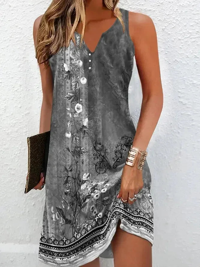 Gray - Sleeveless shift mini dress featuring a vintage-inspired floral and border print with a button-front V-neckline.