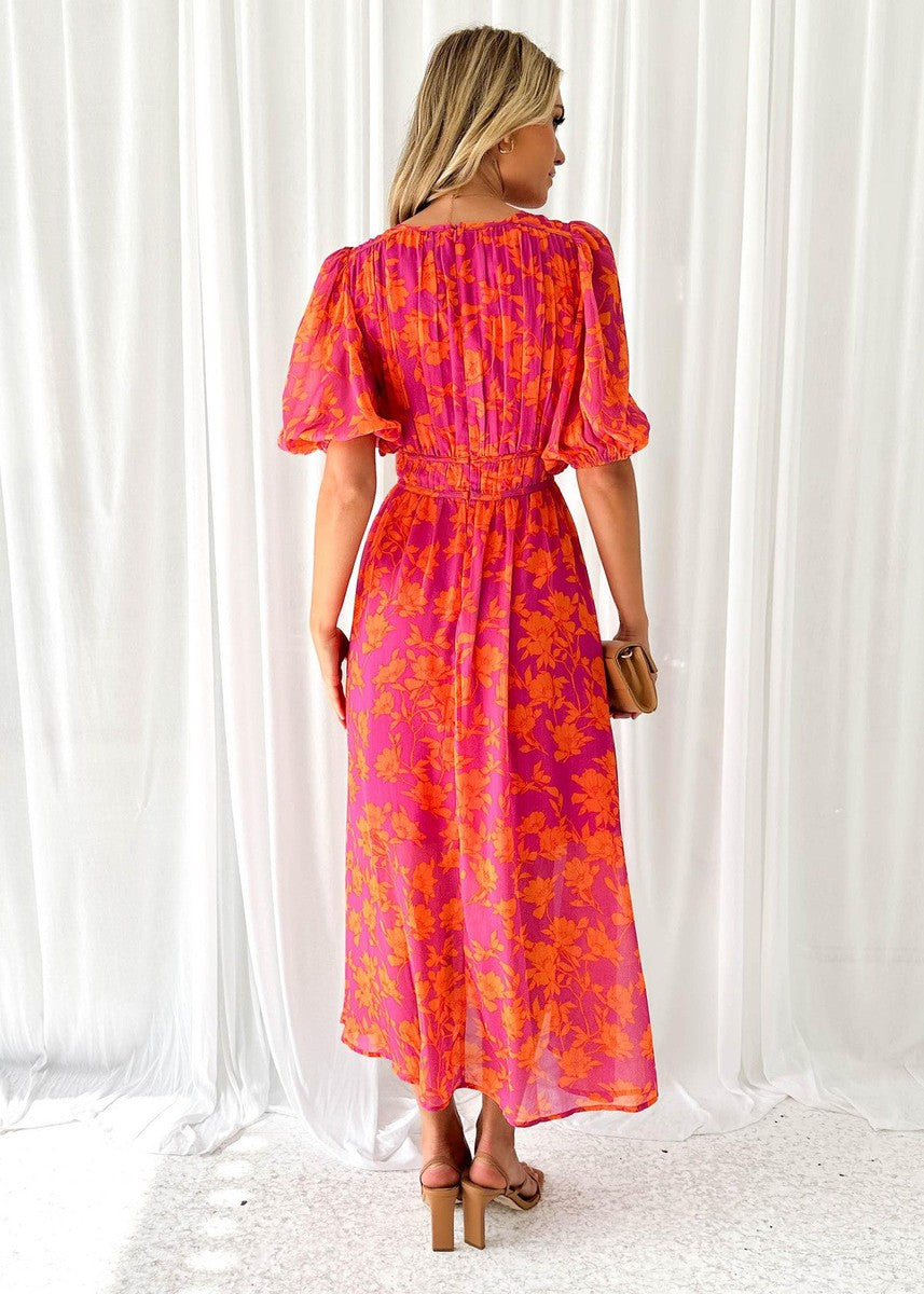 Orange - Bright pink and orange floral chiffon midi dress featuring a deep V-neckline, short puff sleeves, and a gathered waist, styled with a flowing skirt.