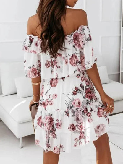 Pink - Black floral chiffon mini dress featuring an off-the-shoulder ruffled neckline and a tiered skirt.
