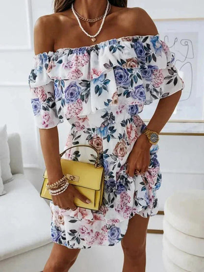 Blue - Black floral chiffon mini dress featuring an off-the-shoulder ruffled neckline and a tiered skirt.