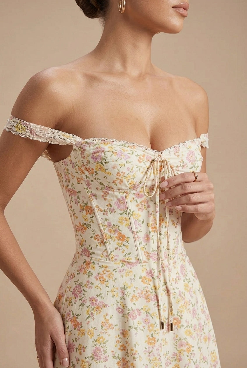 Yellow - Off-the-shoulder midi dress in a light floral print featuring a structured corset bodice, front tie detail, and a lace-trimmed hem.