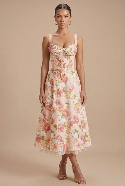 Red - Off-the-shoulder midi dress in a light floral print featuring a structured corset bodice, front tie detail, and a lace-trimmed hem.