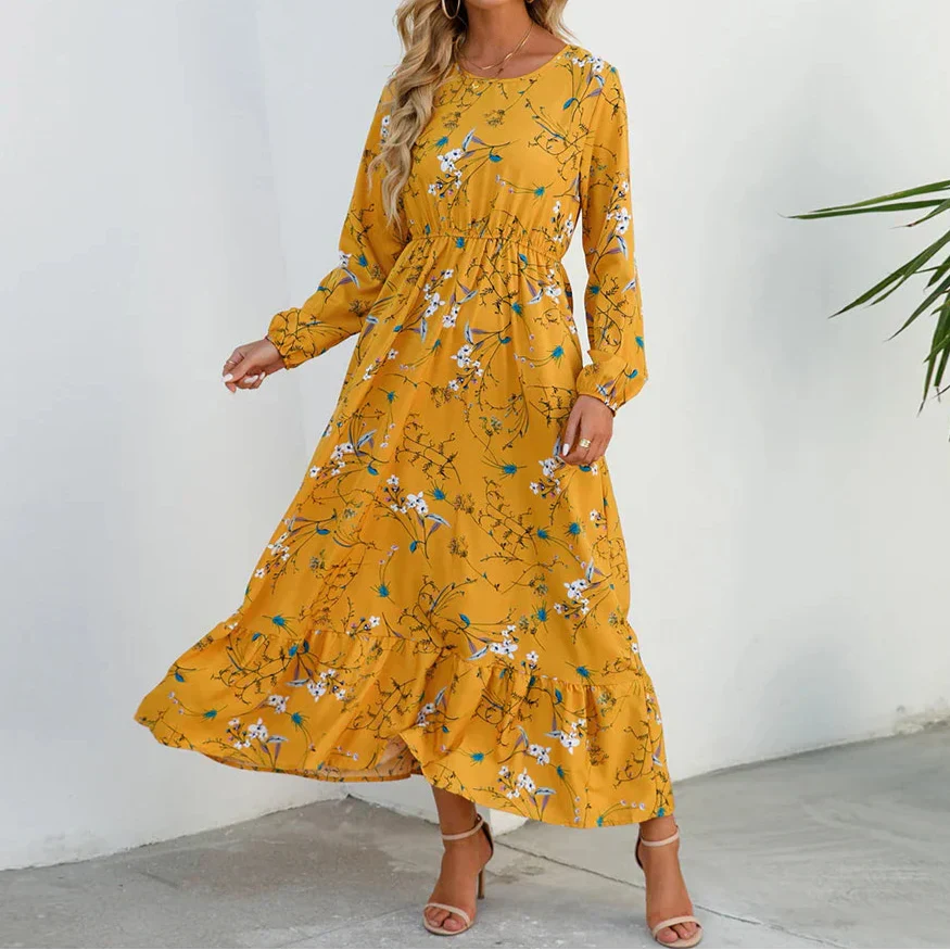 Yellow (Almost sold out) - Woman wearing a long sleeve floral midi dress with a cinched waist and tiered hem