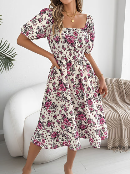 White - Woman wearing a floral off-shoulder midi dress with puff sleeves, a smocked waist, and a ruffle hem, holding a woven straw bag
