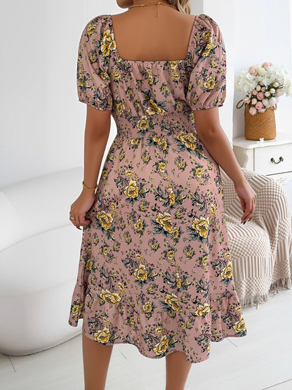 Pink - Woman wearing a floral off-shoulder midi dress with puff sleeves, a smocked waist, and a ruffle hem, holding a woven straw bag
