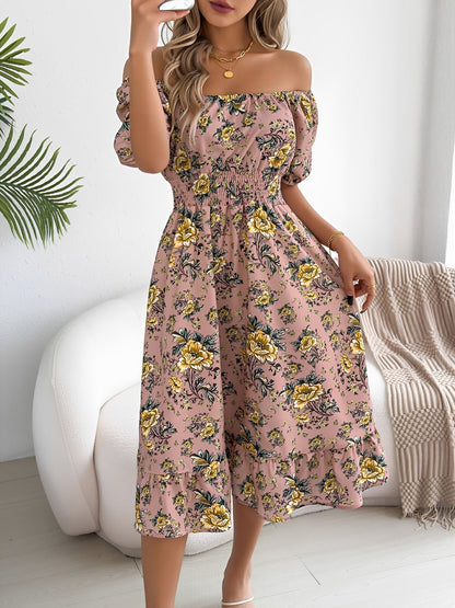 Pink - Woman wearing a floral off-shoulder midi dress with puff sleeves, a smocked waist, and a ruffle hem, holding a woven straw bag