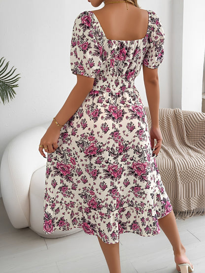 White - Woman wearing a floral off-shoulder midi dress with puff sleeves, a smocked waist, and a ruffle hem, holding a woven straw bag