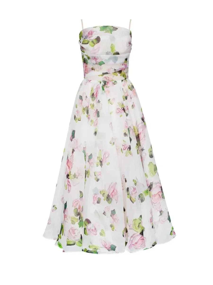 Apricot - White midi dress with pink and green floral print, featuring a ruched bodice, spaghetti straps, and a full A-line skirt.