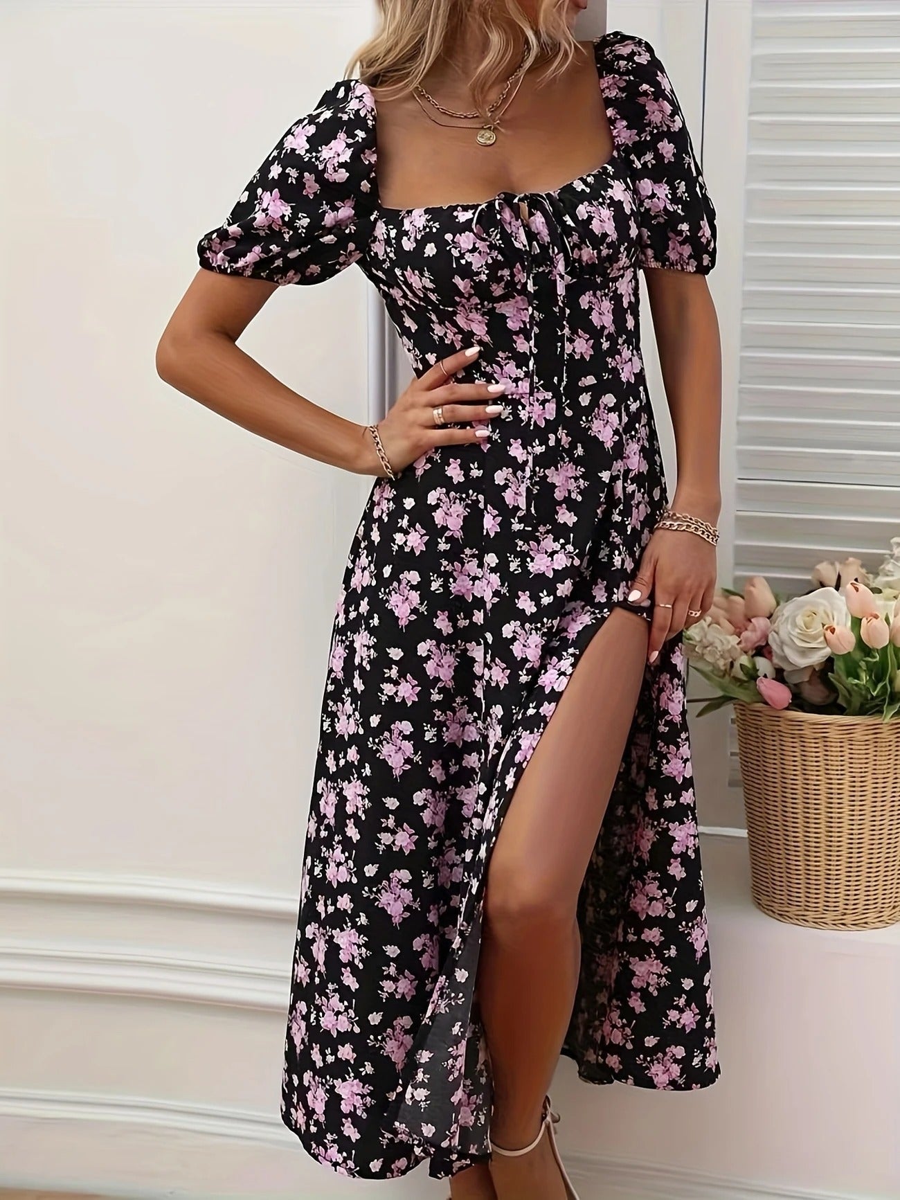 Pink - Black maxi dress with yellow floral print, featuring puff sleeves, sweetheart neckline with front tie, and a high side slit.