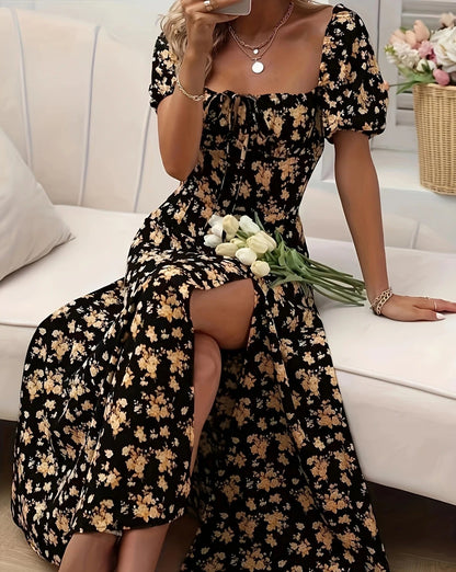 Blue - Black maxi dress with yellow floral print, featuring puff sleeves, sweetheart neckline with front tie, and a high side slit.
