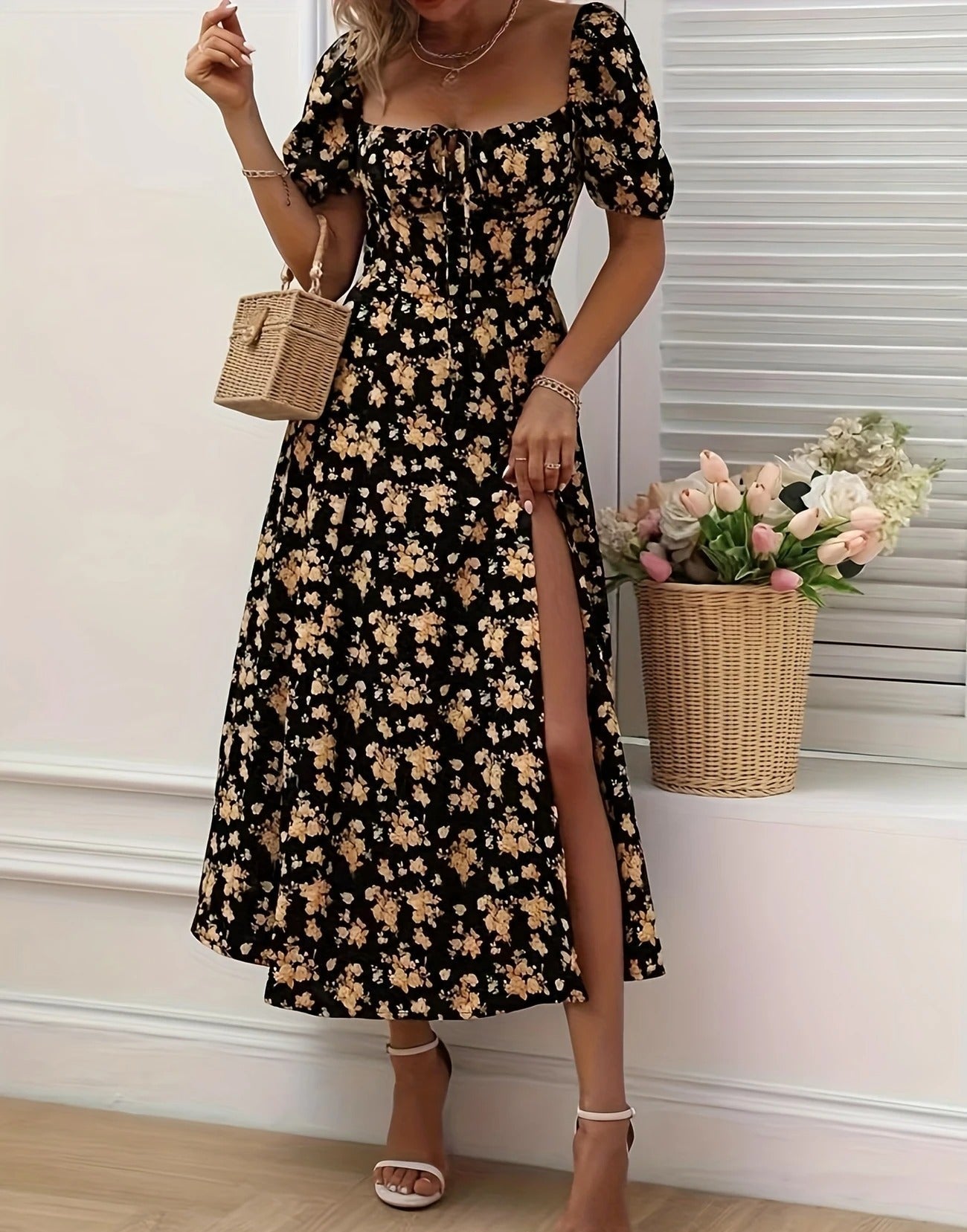 Blue - Black maxi dress with yellow floral print, featuring puff sleeves, sweetheart neckline with front tie, and a high side slit.