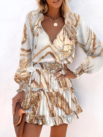 Khaki - Woman wearing a dark mini dress with large bright floral print, featuring long sleeves, a smocked waist, and a tiered ruffle skirt
